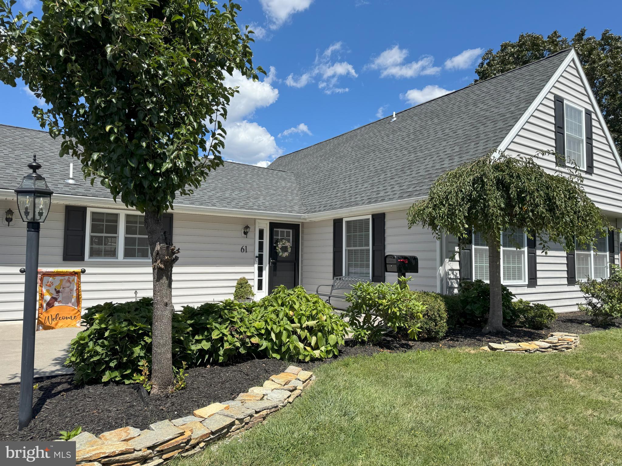 61 Rose Apple Road Levittown, PA 19056 - Photo 1 of 33 front view of a house with a yard