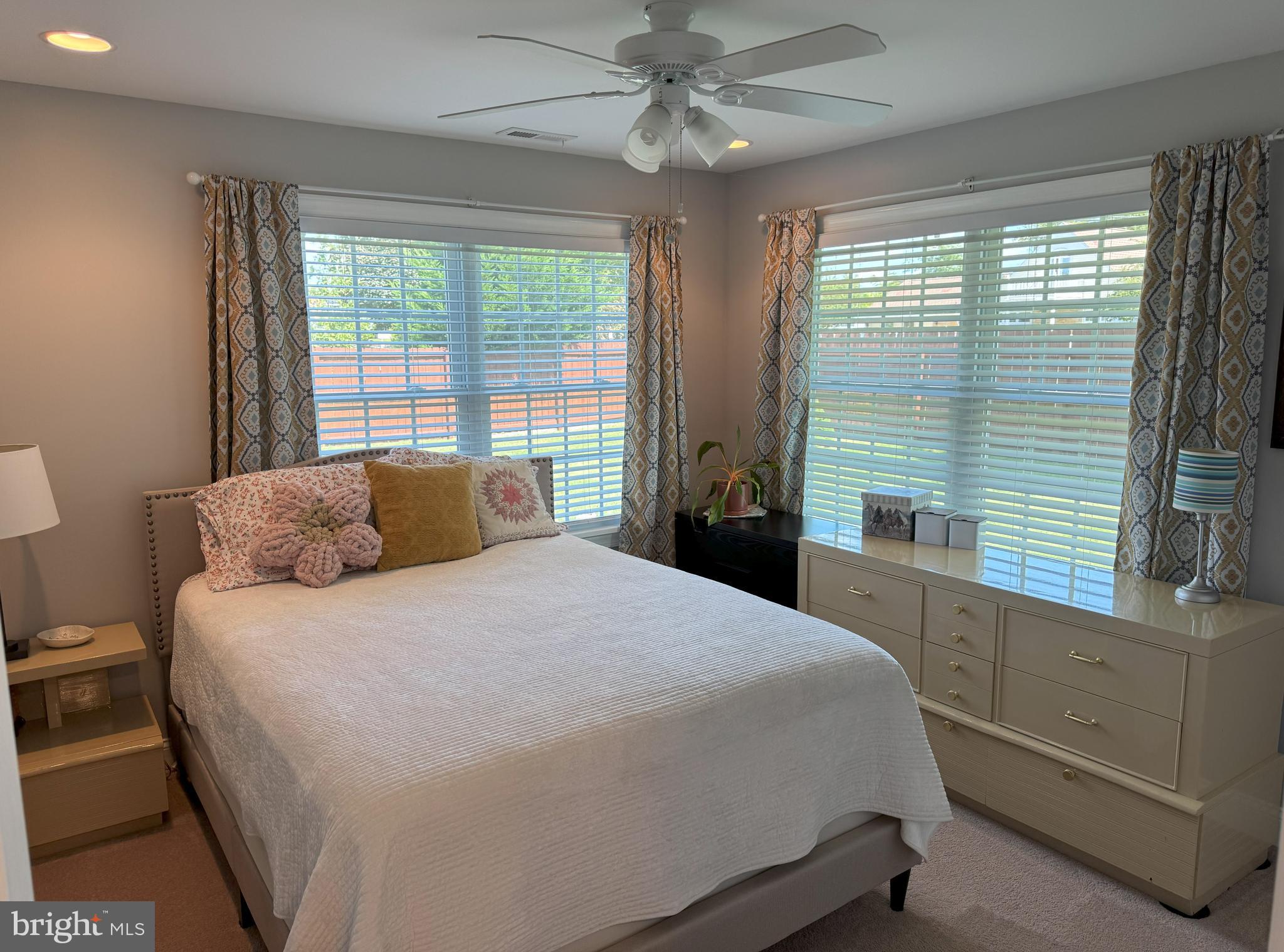 61 Rose Apple Road Levittown, PA 19056 - Photo 18 of 33 a bedroom with a large bed and a window