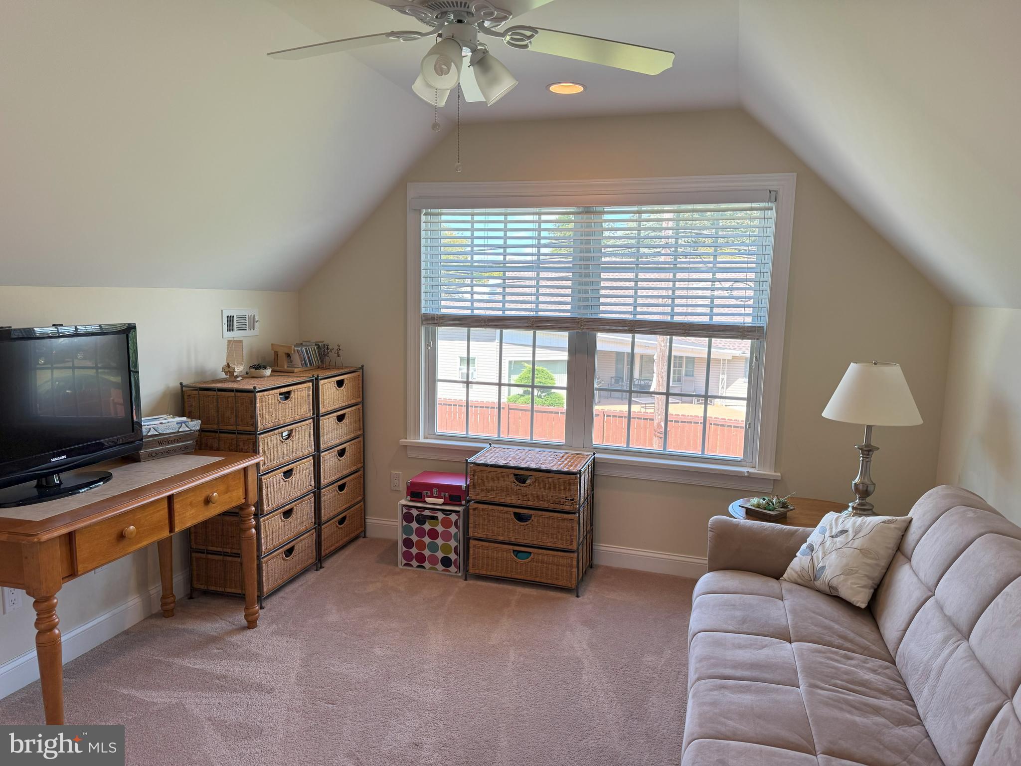 61 Rose Apple Road Levittown, PA 19056 - Photo 23 of 33 a living room with furniture and a flat screen tv