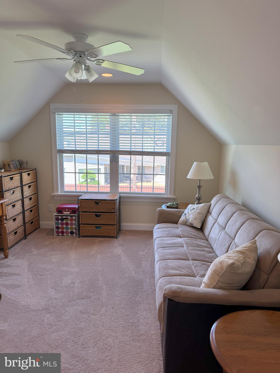 61 Rose Apple Road Levittown, PA 19056 - Photo 24 of 33 a living room with furniture and a chandelier