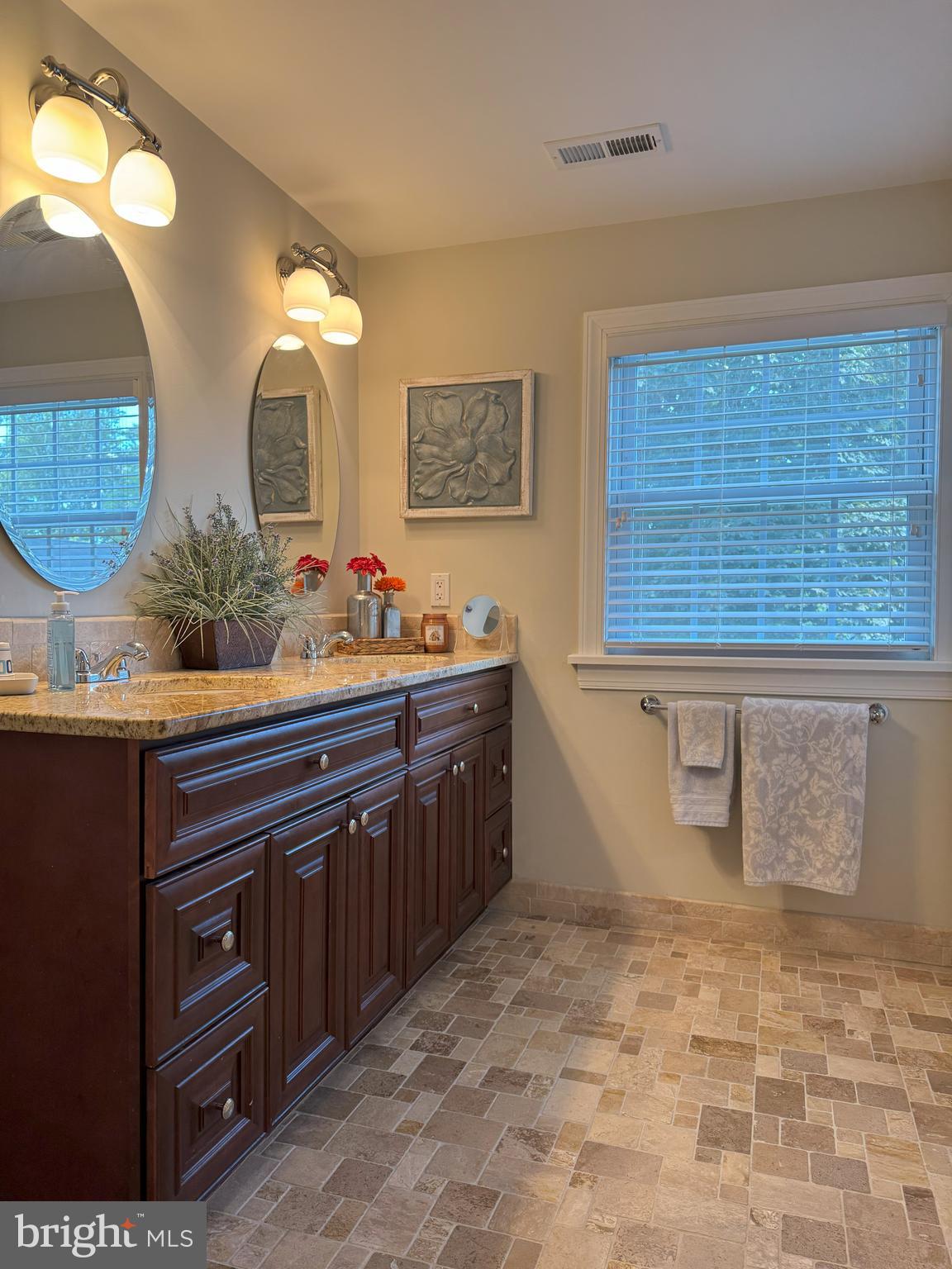 61 Rose Apple Road Levittown, PA 19056 - Photo 25 of 33 a bathroom with a sink and a mirror