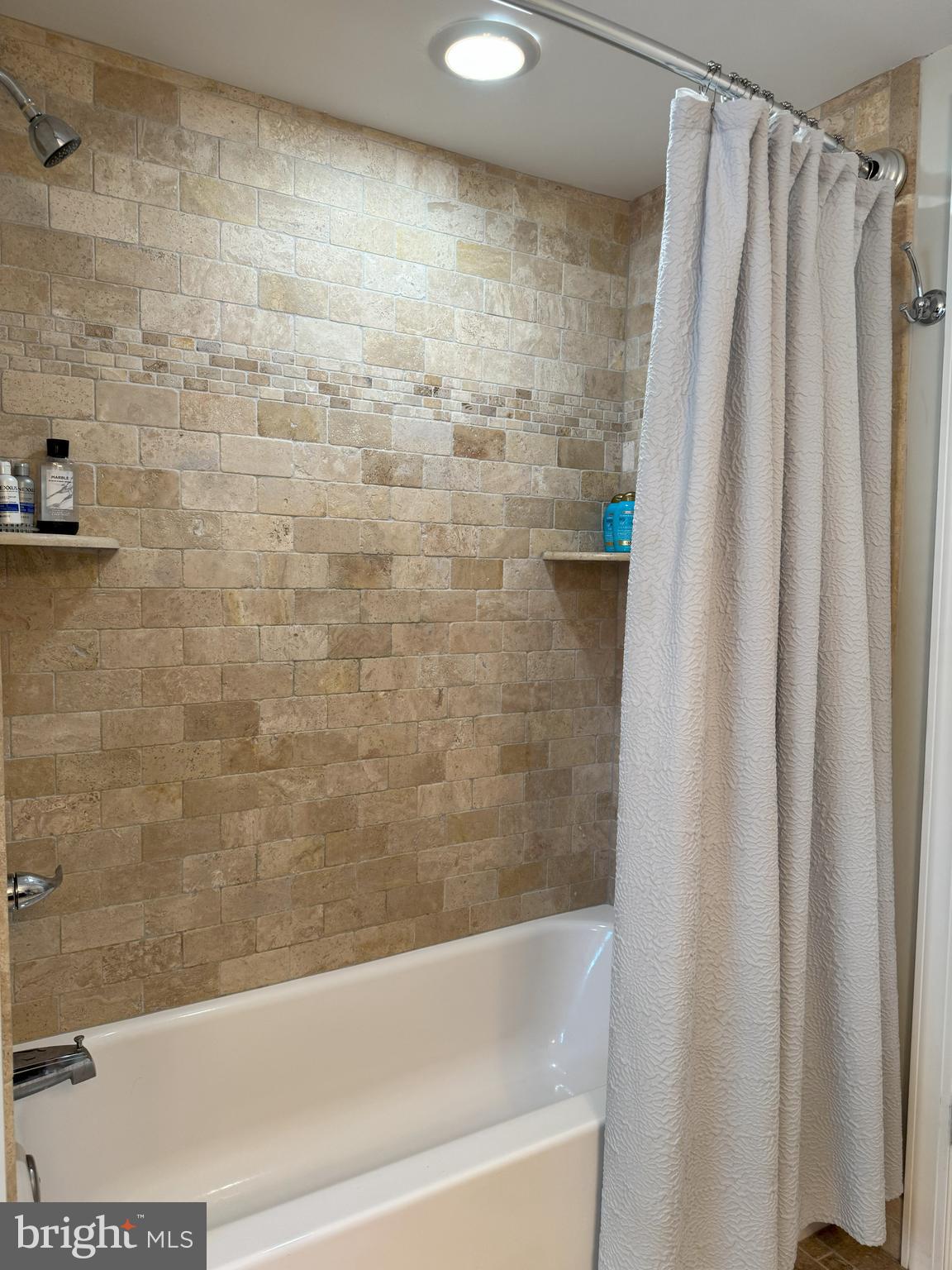 61 Rose Apple Road Levittown, PA 19056 - Photo 26 of 33 a bathroom with a shower and a tub
