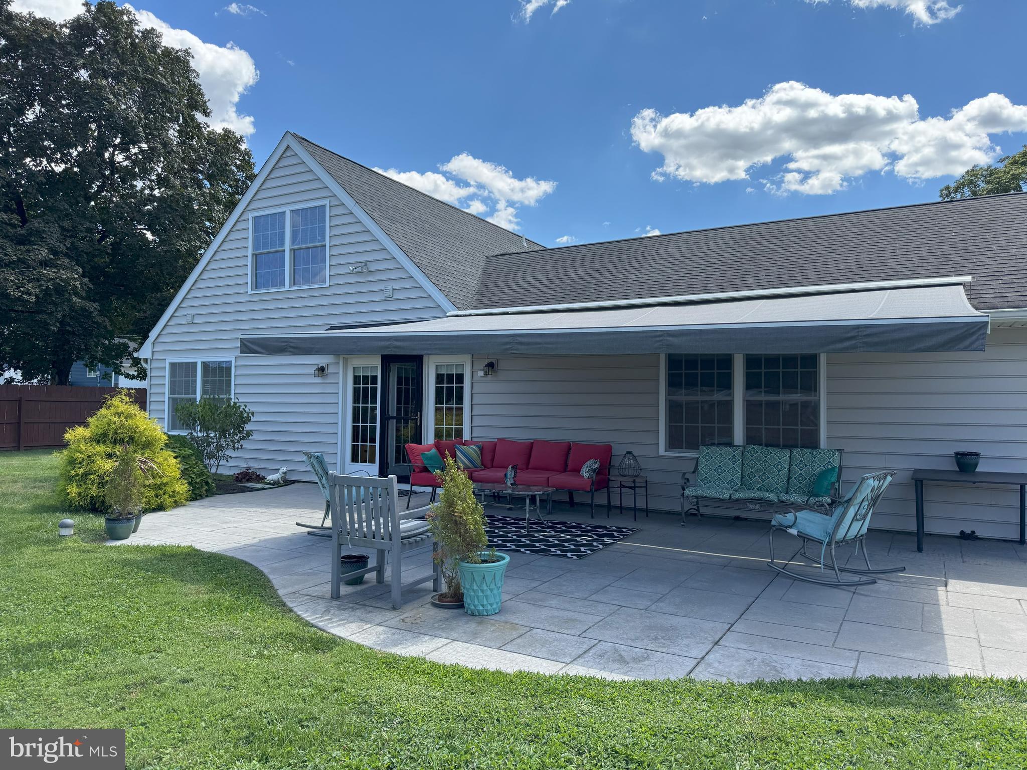 61 Rose Apple Road Levittown, PA 19056 - Photo 27 of 33 a front view of a house with a garden and porch