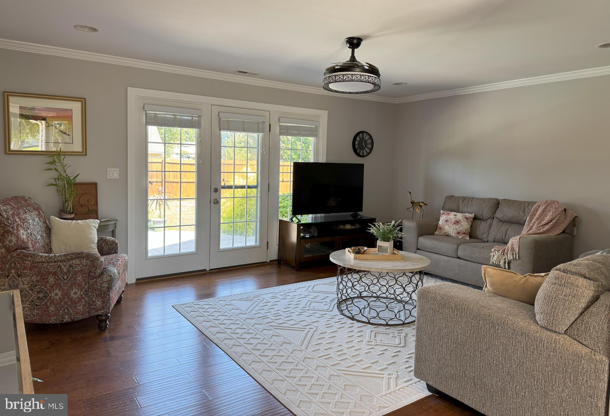 61 Rose Apple Road Levittown, PA 19056 - Photo 6 of 33 a living room with furniture and a flat screen tv