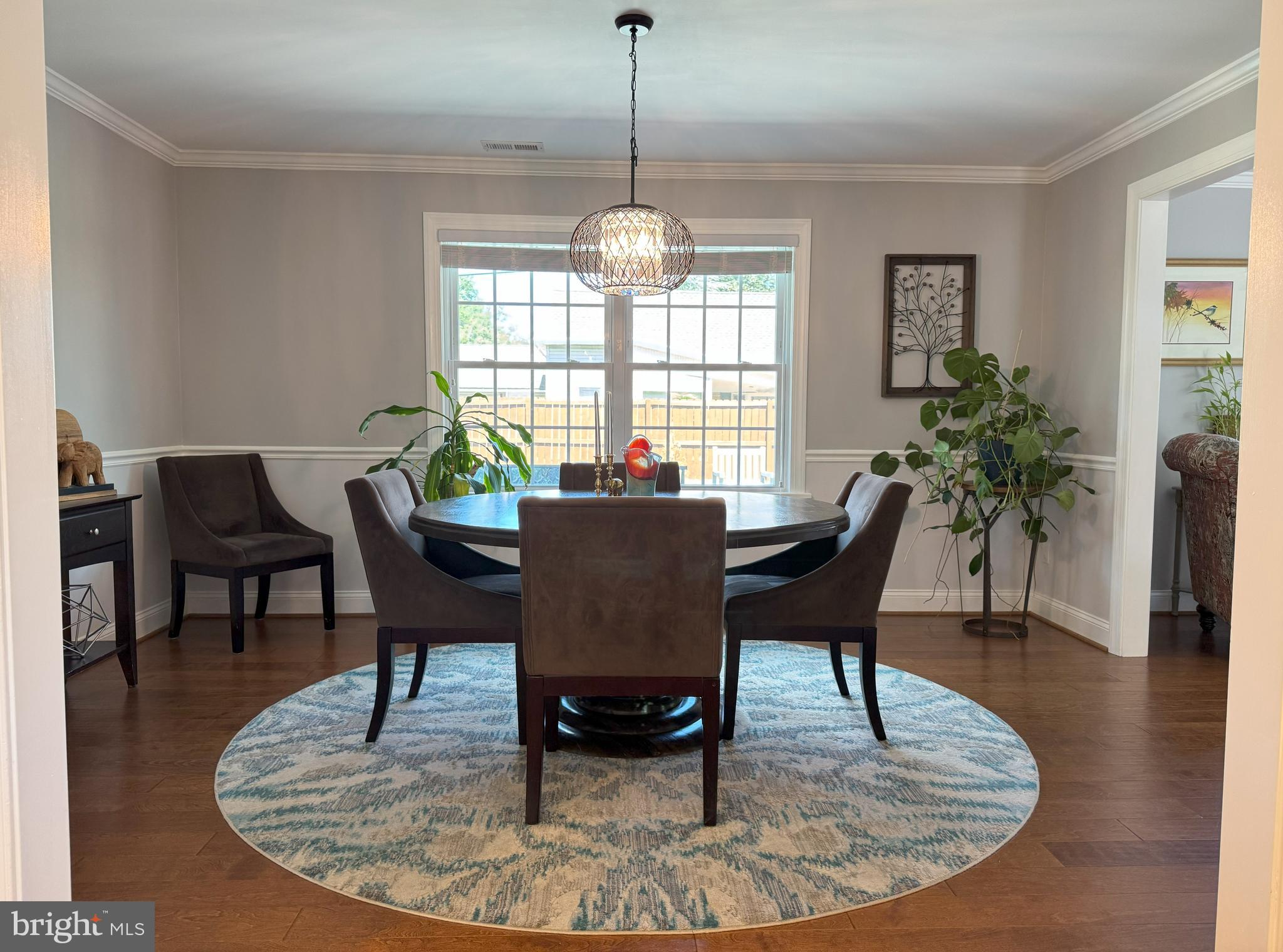 61 Rose Apple Road Levittown, PA 19056 - Photo 10 of 33 a dining room with furniture a rug and wooden floor