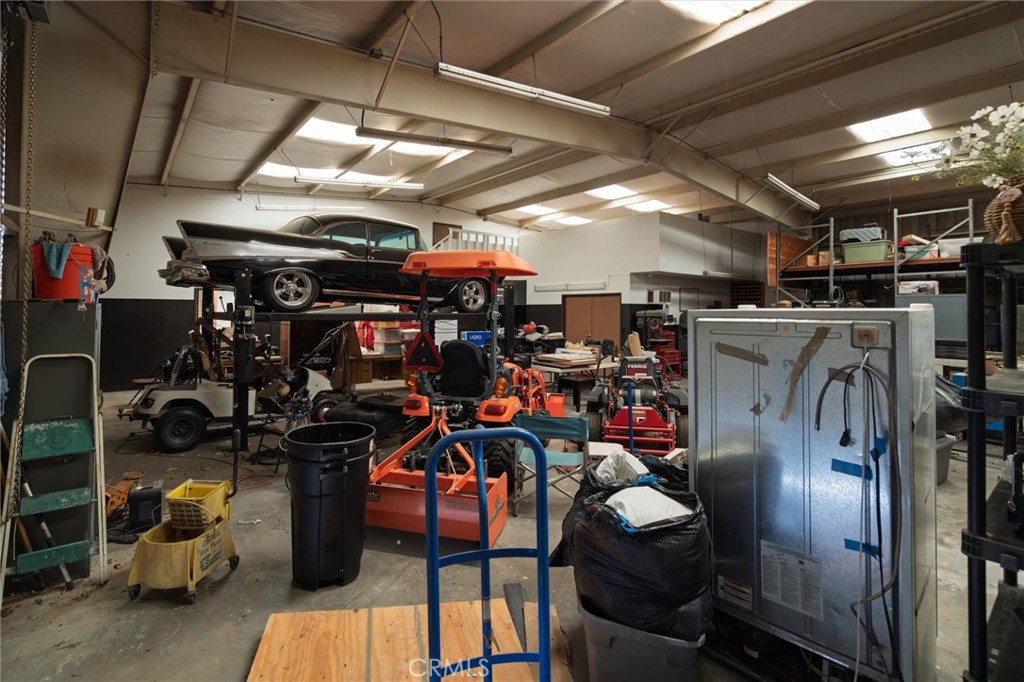 34150 Stowe Road Winchester, CA 92545 - Photo 61 of 80 a view of a storage room with washer and dryer