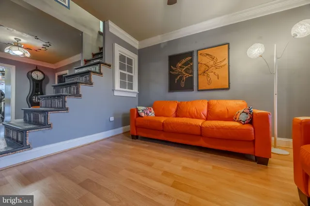 a room with furniture and a wooden floor