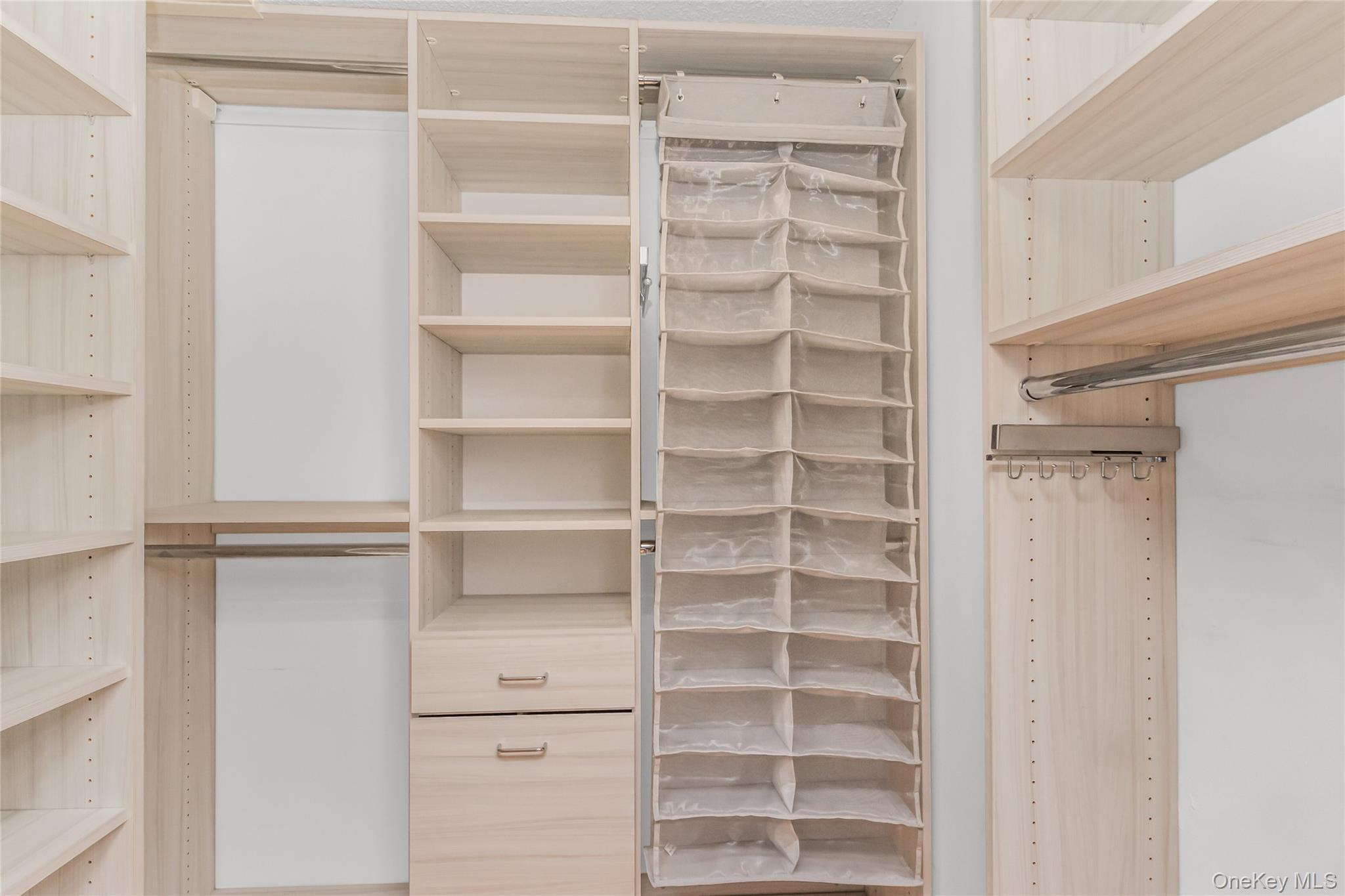 2287 Johnson Avenue, Unit 5F Bronx, NY 10463 - Photo 14 of 22 a view of walk in closet with empty racks