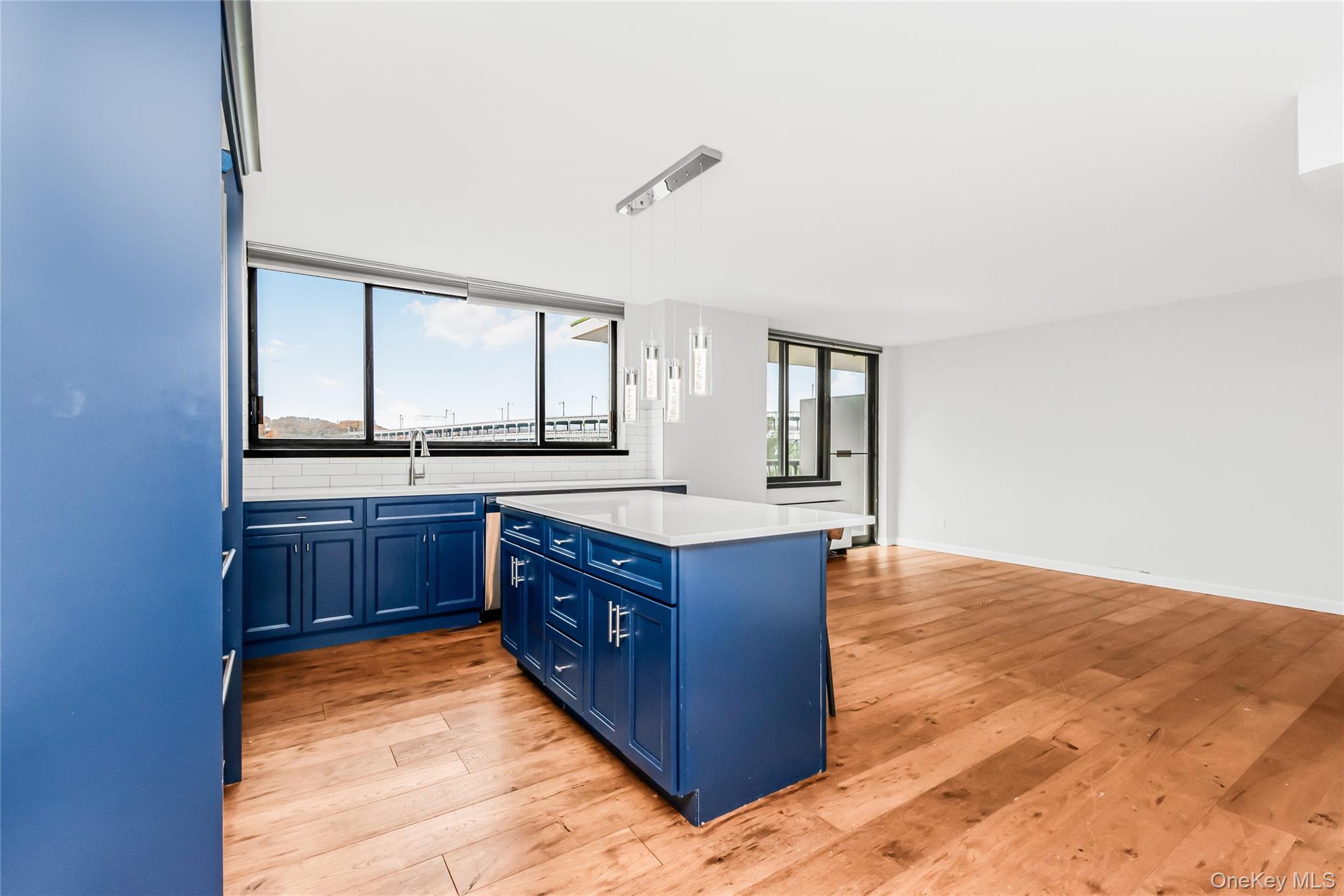2287 Johnson Avenue, Unit 5F Bronx, NY 10463 - Photo 5 of 22 a kitchen with stainless steel appliances granite countertop a stove and a sink