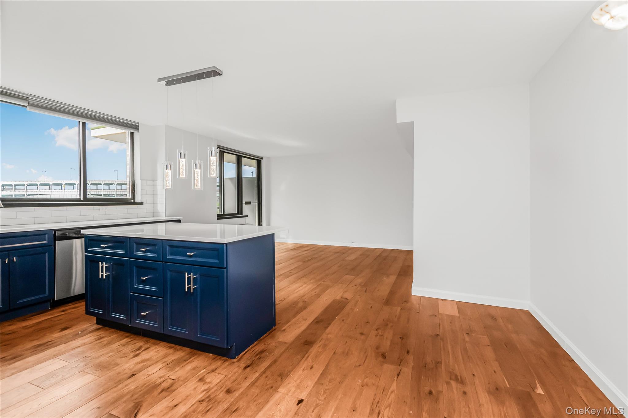 2287 Johnson Avenue, Unit 5F Bronx, NY 10463 - Photo 6 of 22 a room with a dresser and a wooden floor