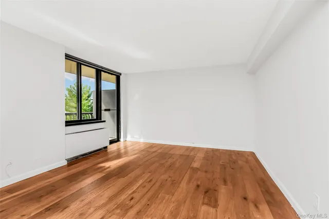 a view of an empty room with window