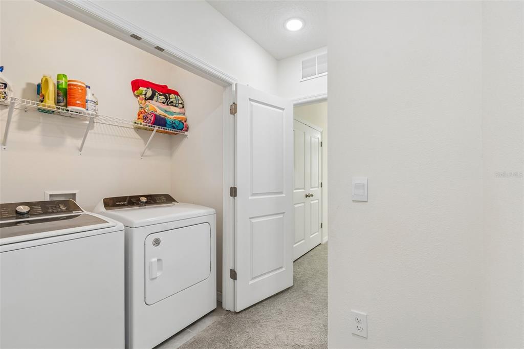 33083 Frosted Clover Way Wesley Chapel, FL 33545 - Photo 40 of 70 a utility room with dryer and washer
