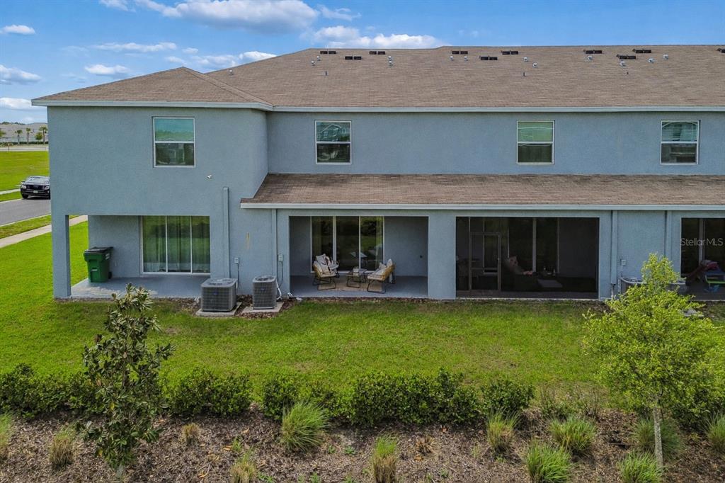 33083 Frosted Clover Way Wesley Chapel, FL 33545 - Photo 54 of 70 a view of a house with a garden