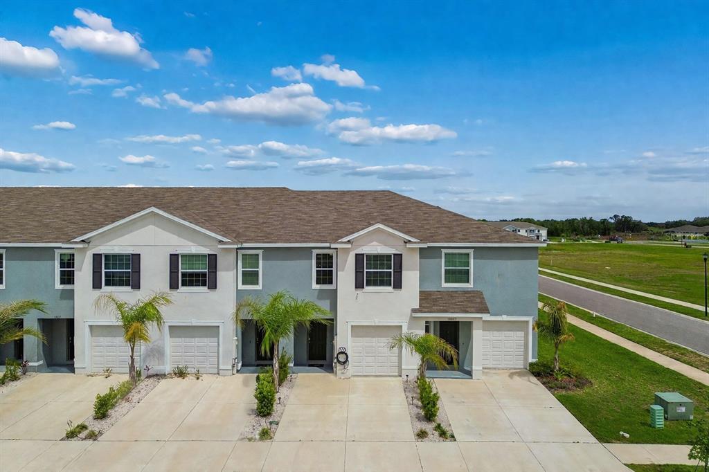 33083 Frosted Clover Way Wesley Chapel, FL 33545 - Photo 55 of 70 a view of a house with a patio