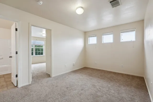 an empty room with windows