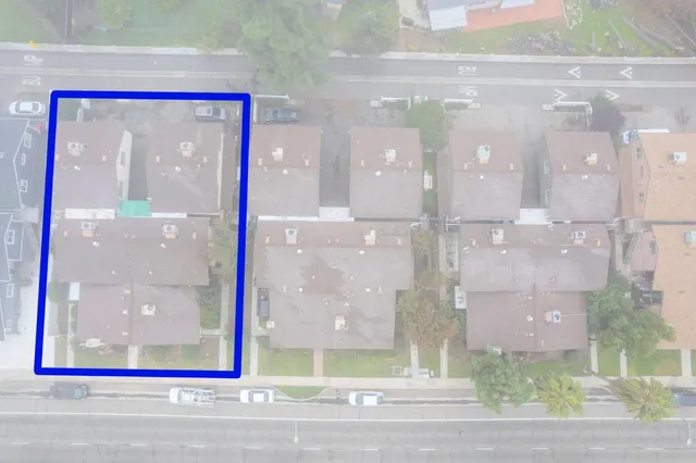 a view of a glass door of a living room