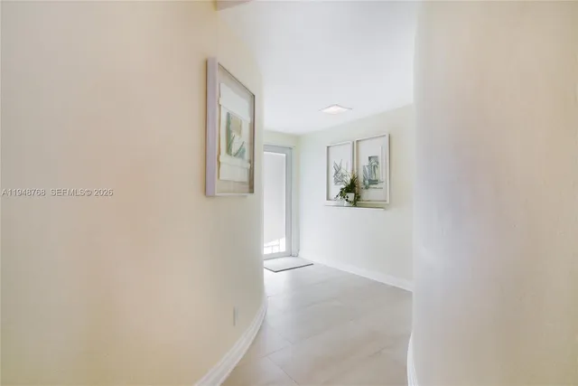 a view of a hallway with closet