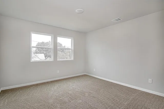 an empty room with a window