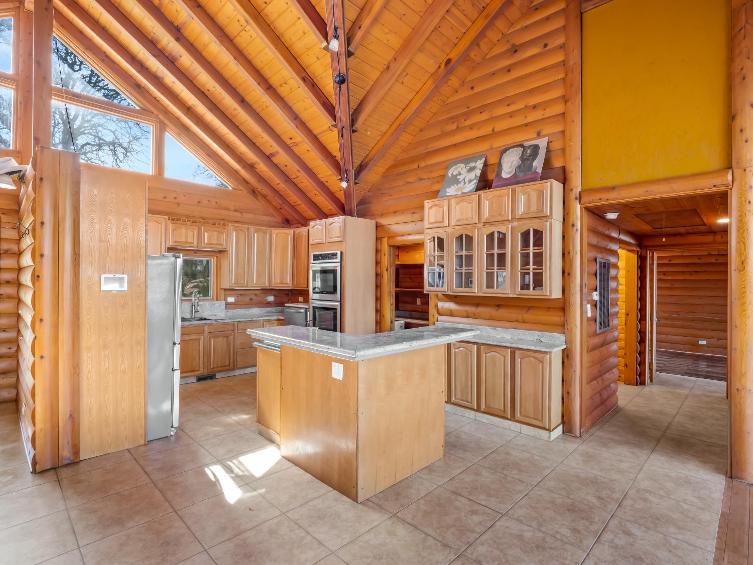 37678 Cardinal Lane Squaw Valley, CA 93675 - Photo 34 of 65 a view of a kitchen with stainless steel appliances and cabinets