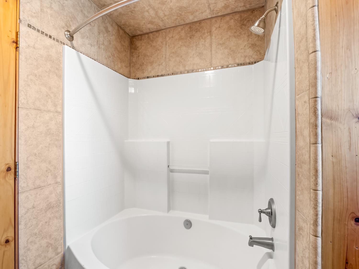 37678 Cardinal Lane Squaw Valley, CA 93675 - Photo 35 of 65 a bathroom with a white bath tub and a shower