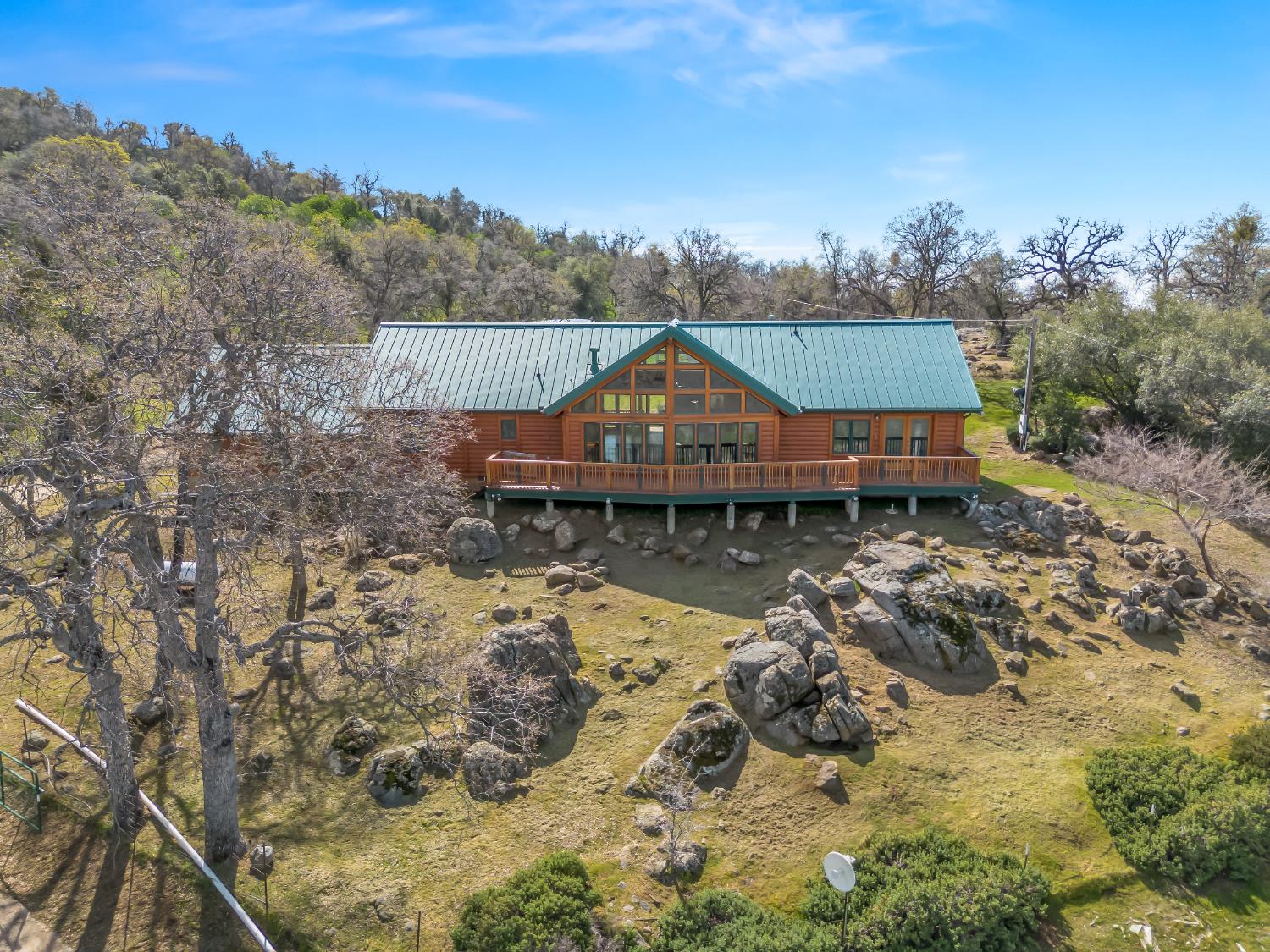 37678 Cardinal Lane Squaw Valley, CA 93675 - Photo 4 of 65 a view of a house with a yard and wooden fence