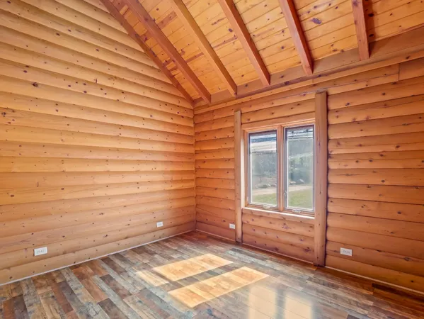 a view of a backyard of the house