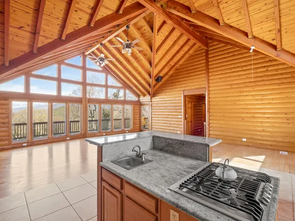 a bathroom with a shower and a sink
