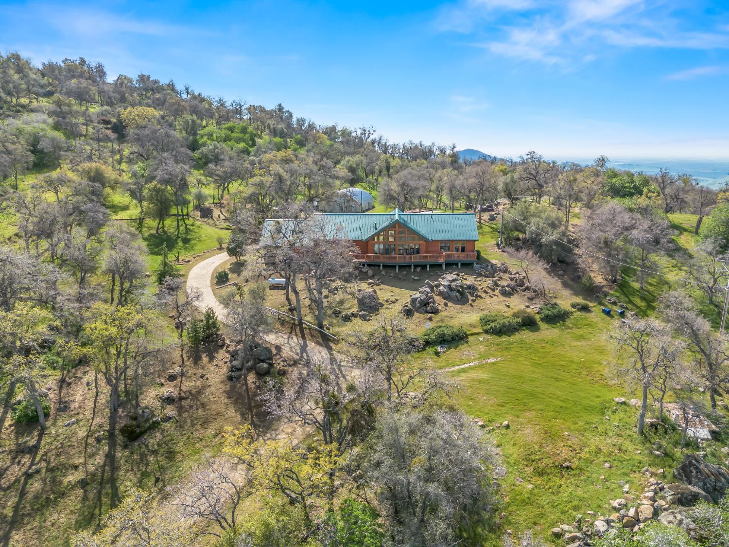 37678 Cardinal Lane Squaw Valley, CA 93675 - Photo 5 of 65 a view of a lake with mountains in the background