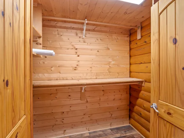 a bathroom with a double vanity sink and a bathtub