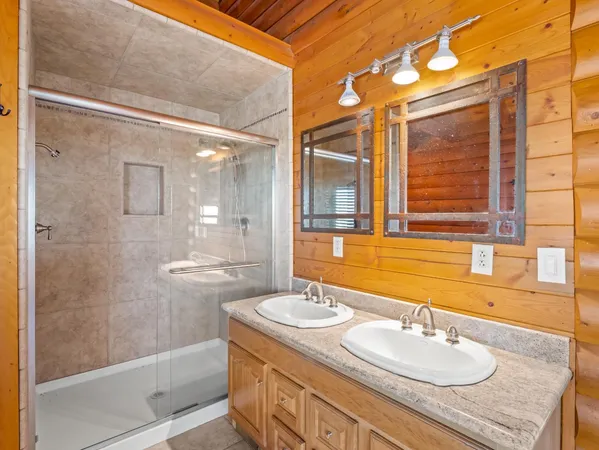 a view of a hall with wooden floor and a yard