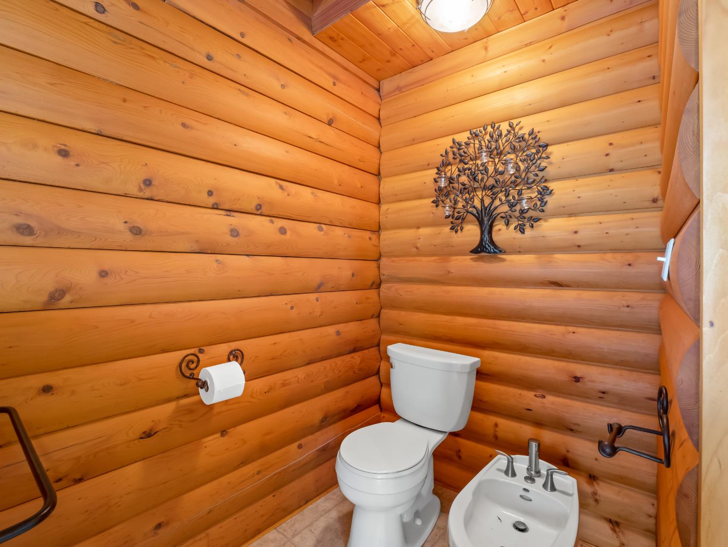 37678 Cardinal Lane Squaw Valley, CA 93675 - Photo 57 of 65 a bathroom with a toilet and a sink