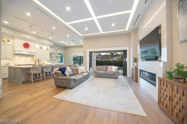 Undisclosed Address Naples, FL 34110 - Photo 2 of 18 a living room with furniture and a fireplace