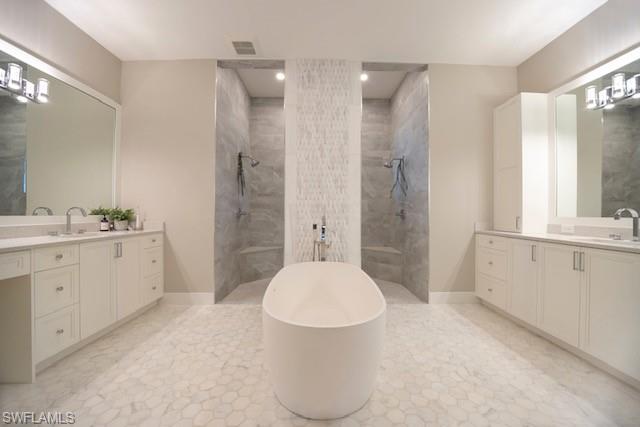 Undisclosed Address Naples, FL 34110 - Photo 9 of 18 a bathroom with a sink a toilet and shower