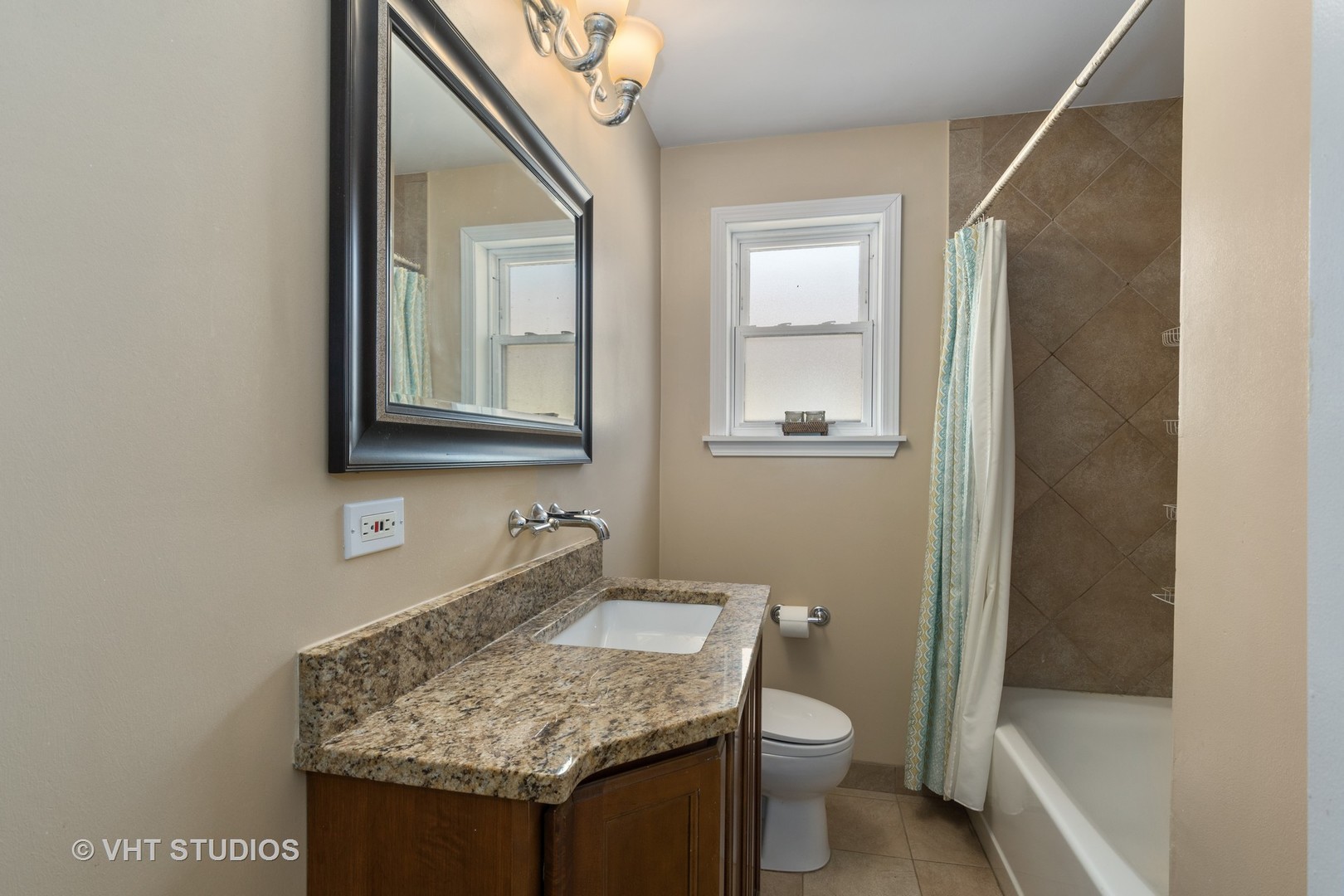 299 Barberry Road Highland Park, IL 60035 - Photo 11 of 17 a bathroom with a granite countertop sink toilet and mirror