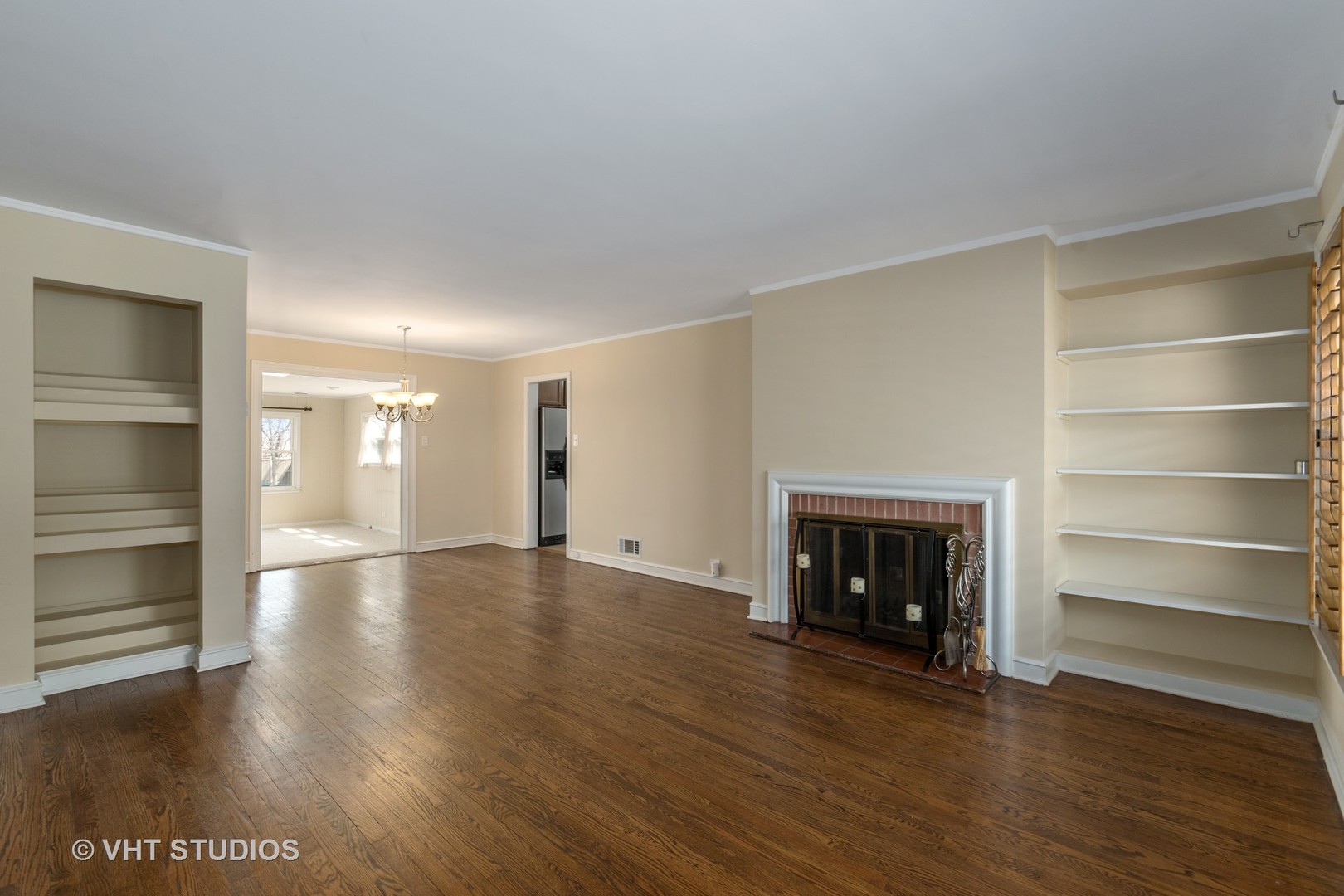 299 Barberry Road Highland Park, IL 60035 - Photo 3 of 17 a view of an empty room with a fireplace and a window