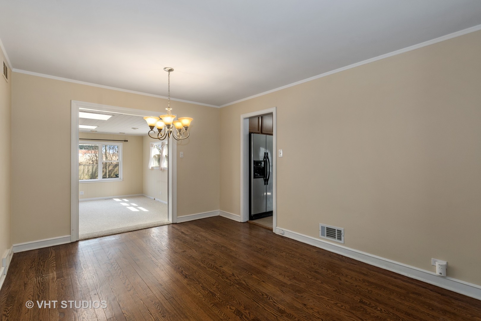 299 Barberry Road Highland Park, IL 60035 - Photo 6 of 17 wooden floor in an empty room with a window