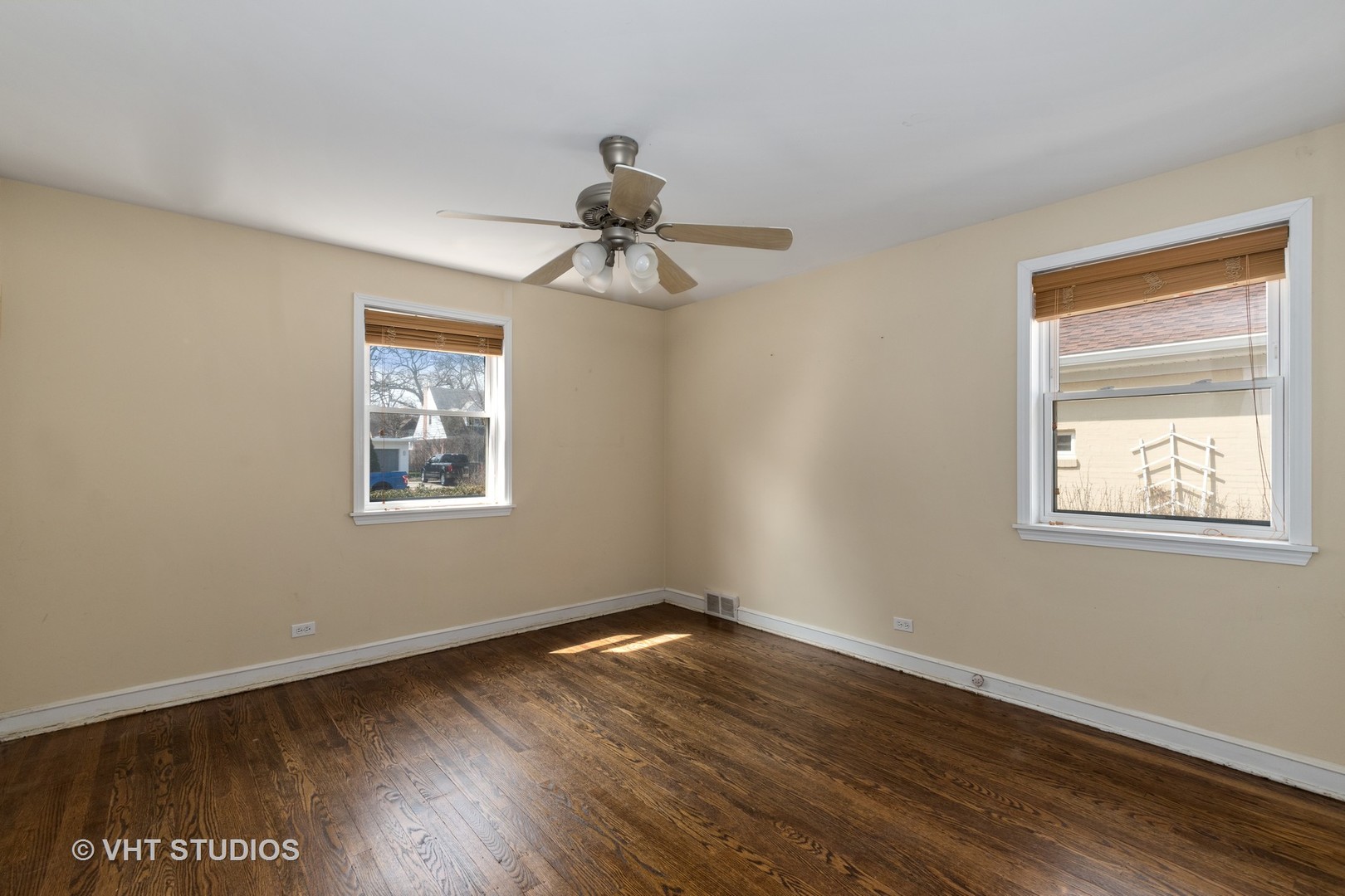 299 Barberry Road Highland Park, IL 60035 - Photo 8 of 17 a view of an empty room with wooden floor and a window