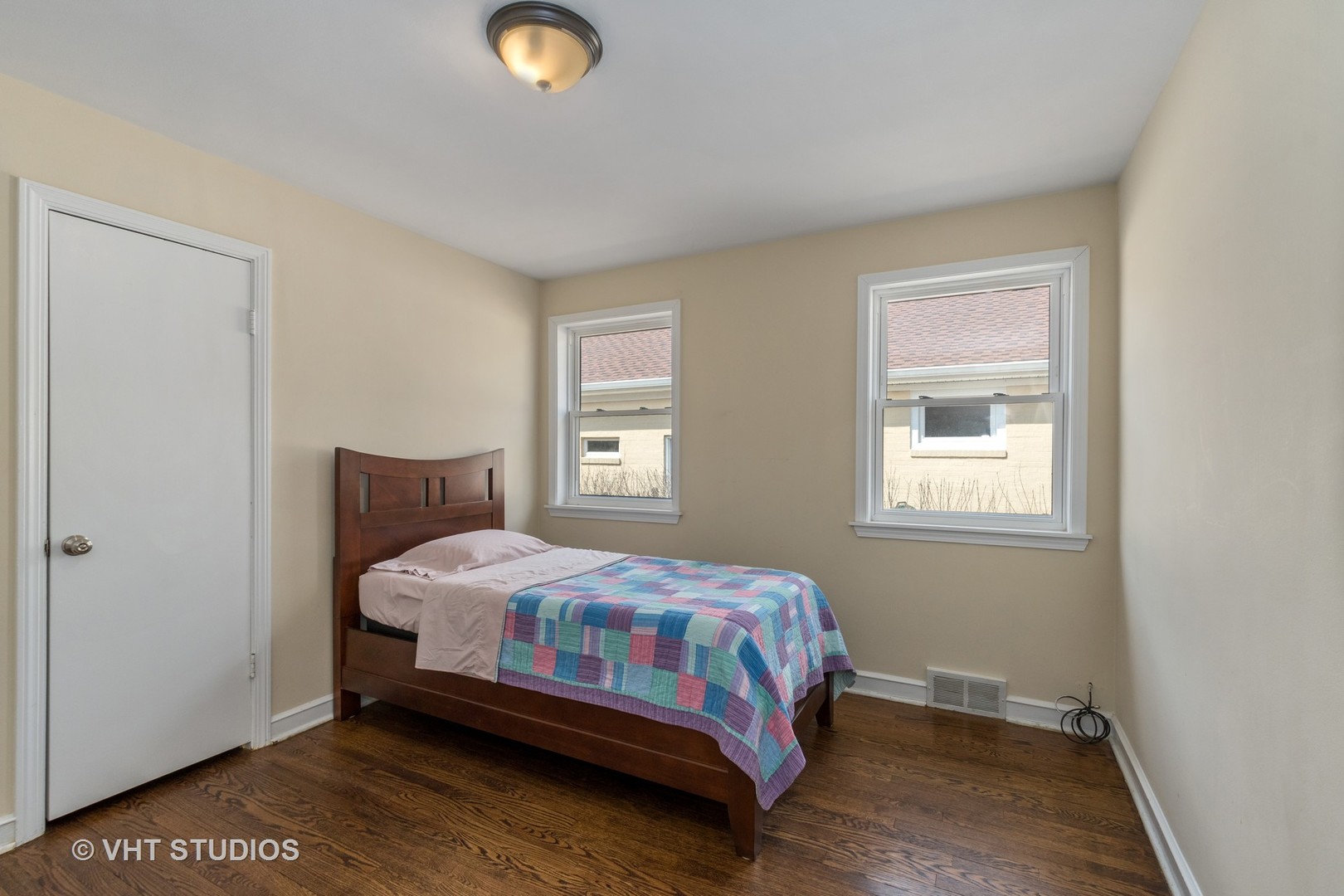 299 Barberry Road Highland Park, IL 60035 - Photo 9 of 17 a bedroom with a bed and window