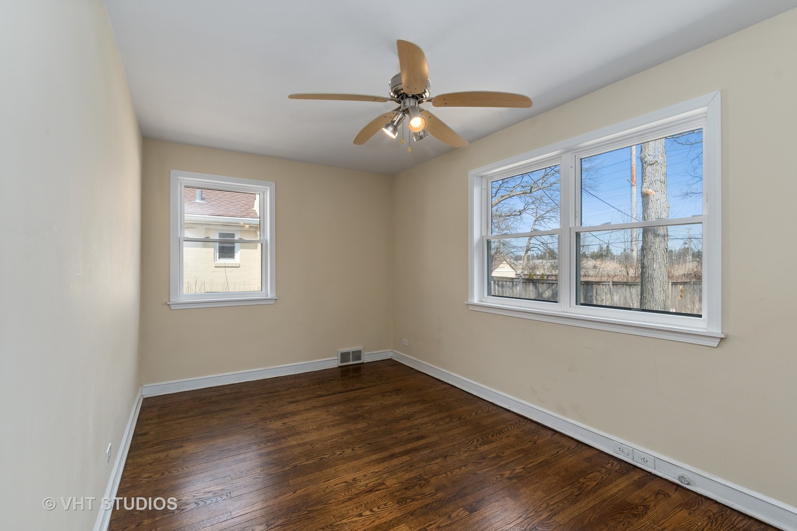 299 Barberry Road Highland Park, IL 60035 - Photo 10 of 17 a view of an empty room with wooden floor and a window