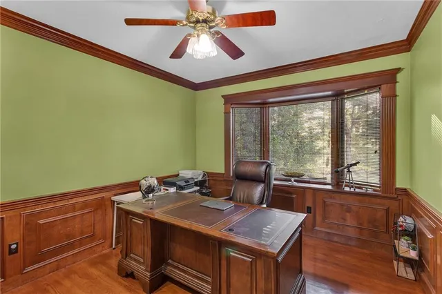 a view of a livingroom with furniture and window