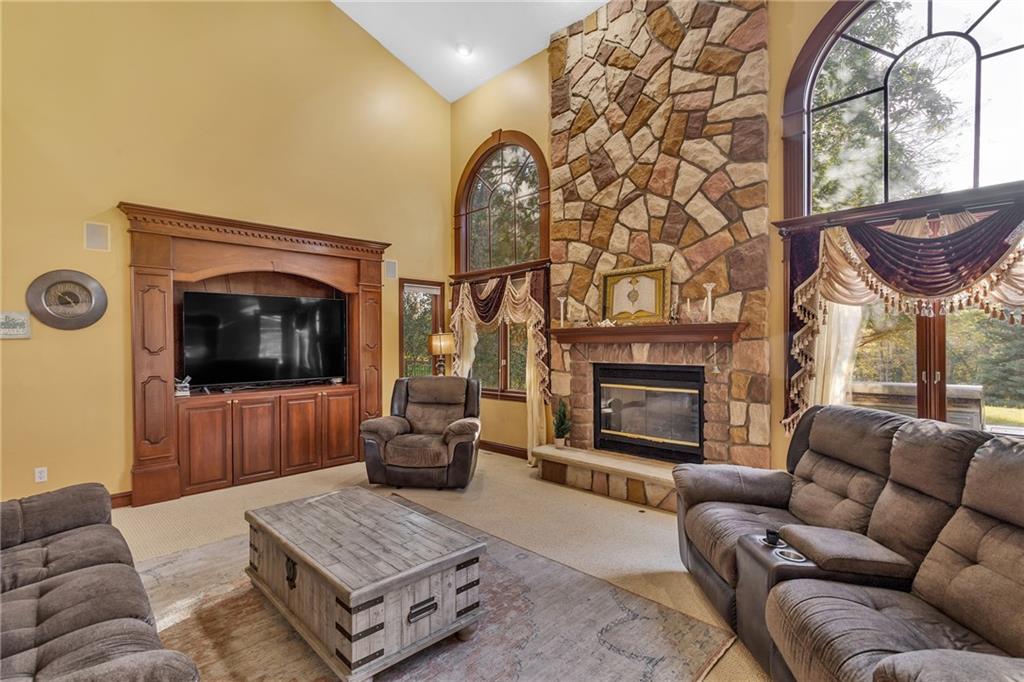 5010 Prides Court Murrysville, PA 15668 - Photo 14 of 49 a living room with furniture and a fireplace