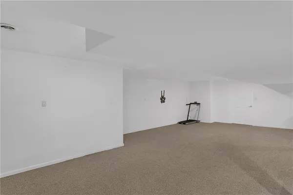 a view of a room with a projector and a window