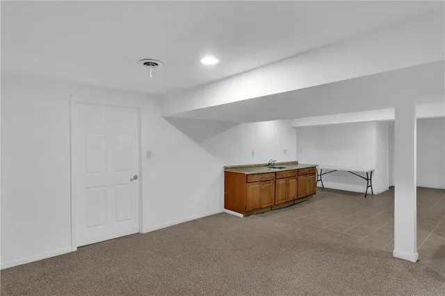 a view of empty room with closet