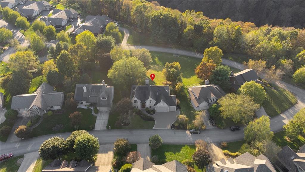 5010 Prides Court Murrysville, PA 15668 - Photo 40 of 49 an aerial view of a house with a yard and large trees