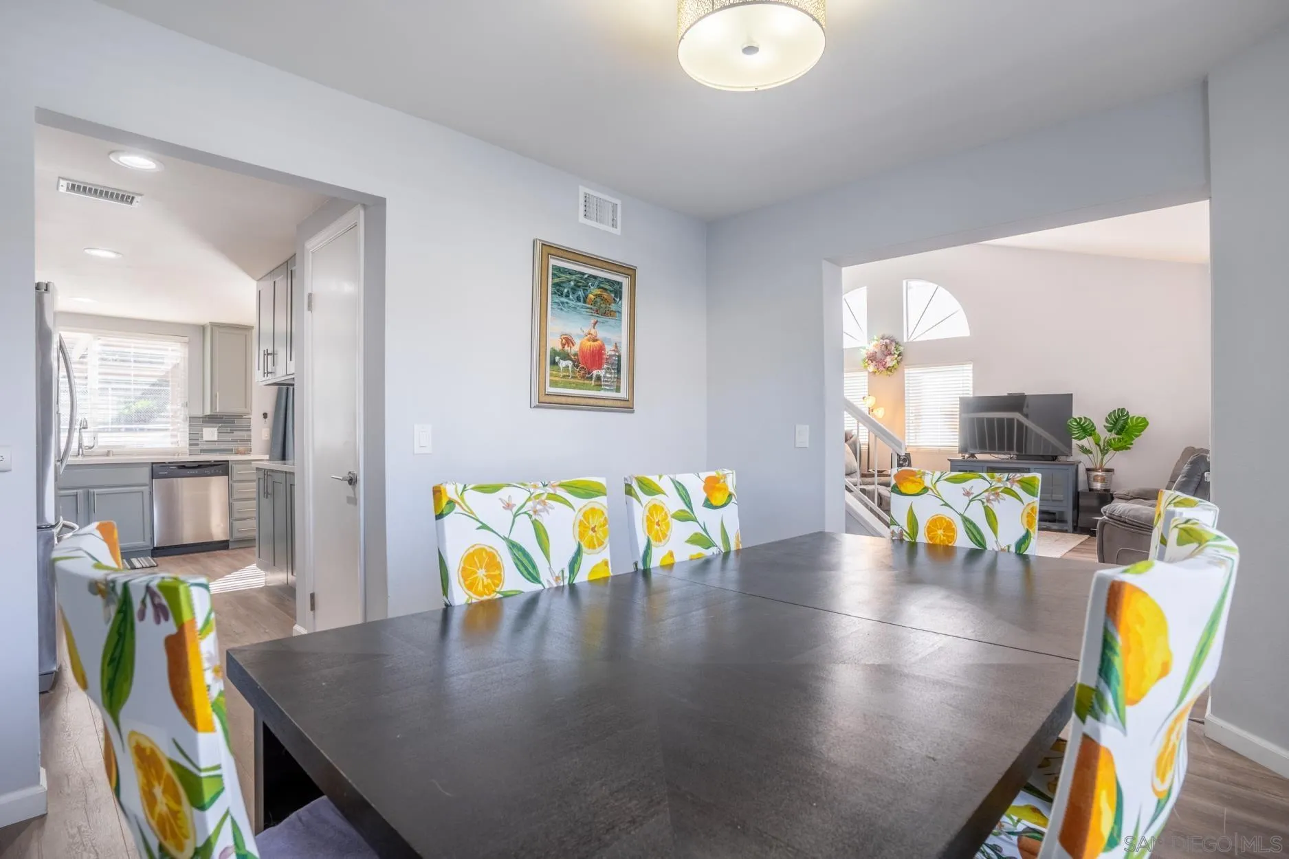 4857 Northerly Street Oceanside, CA 92056 - Photo 11 of 32 a view of kitchen and dining room with furniture