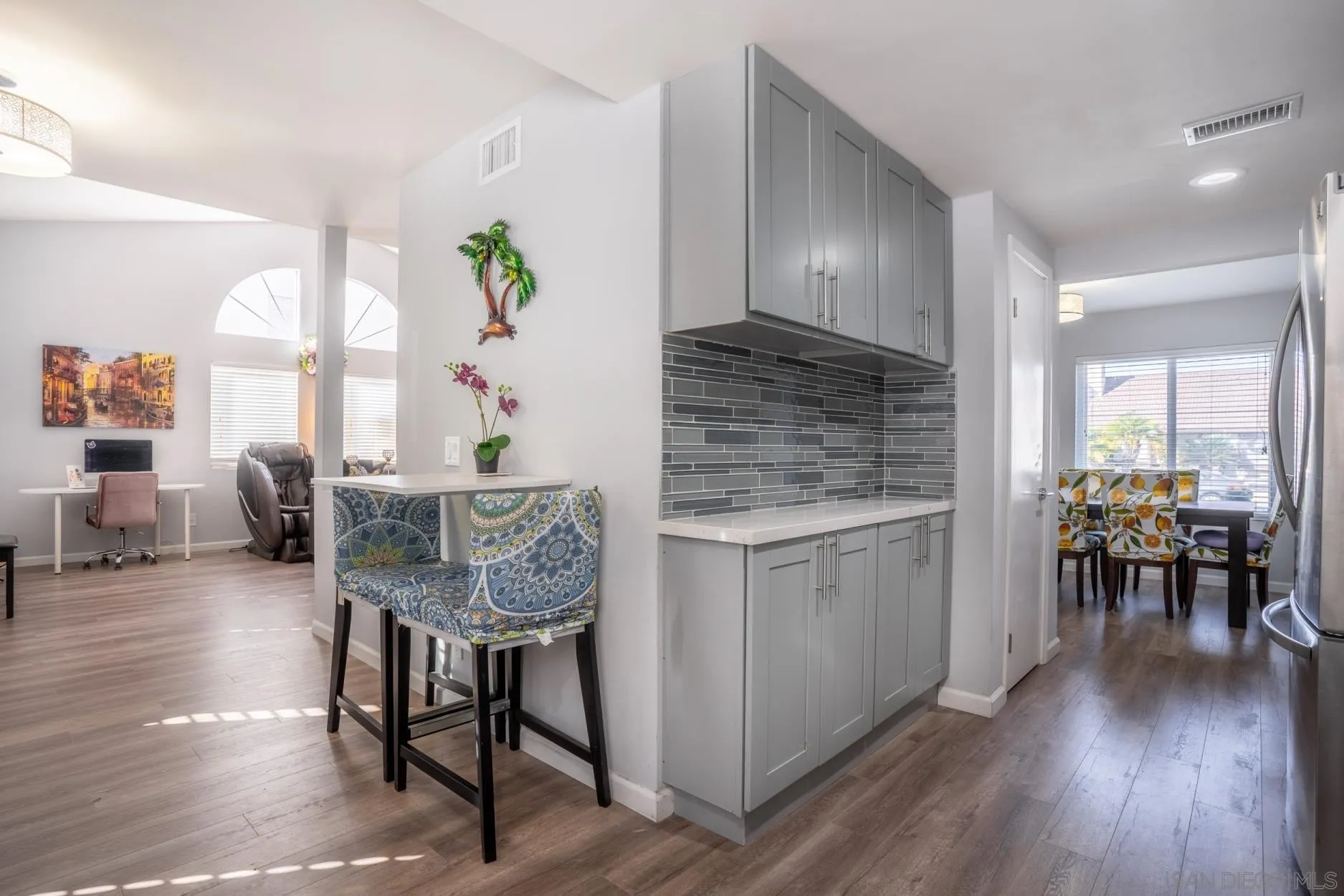 4857 Northerly Street Oceanside, CA 92056 - Photo 14 of 32 a living room with furniture and wooden floor