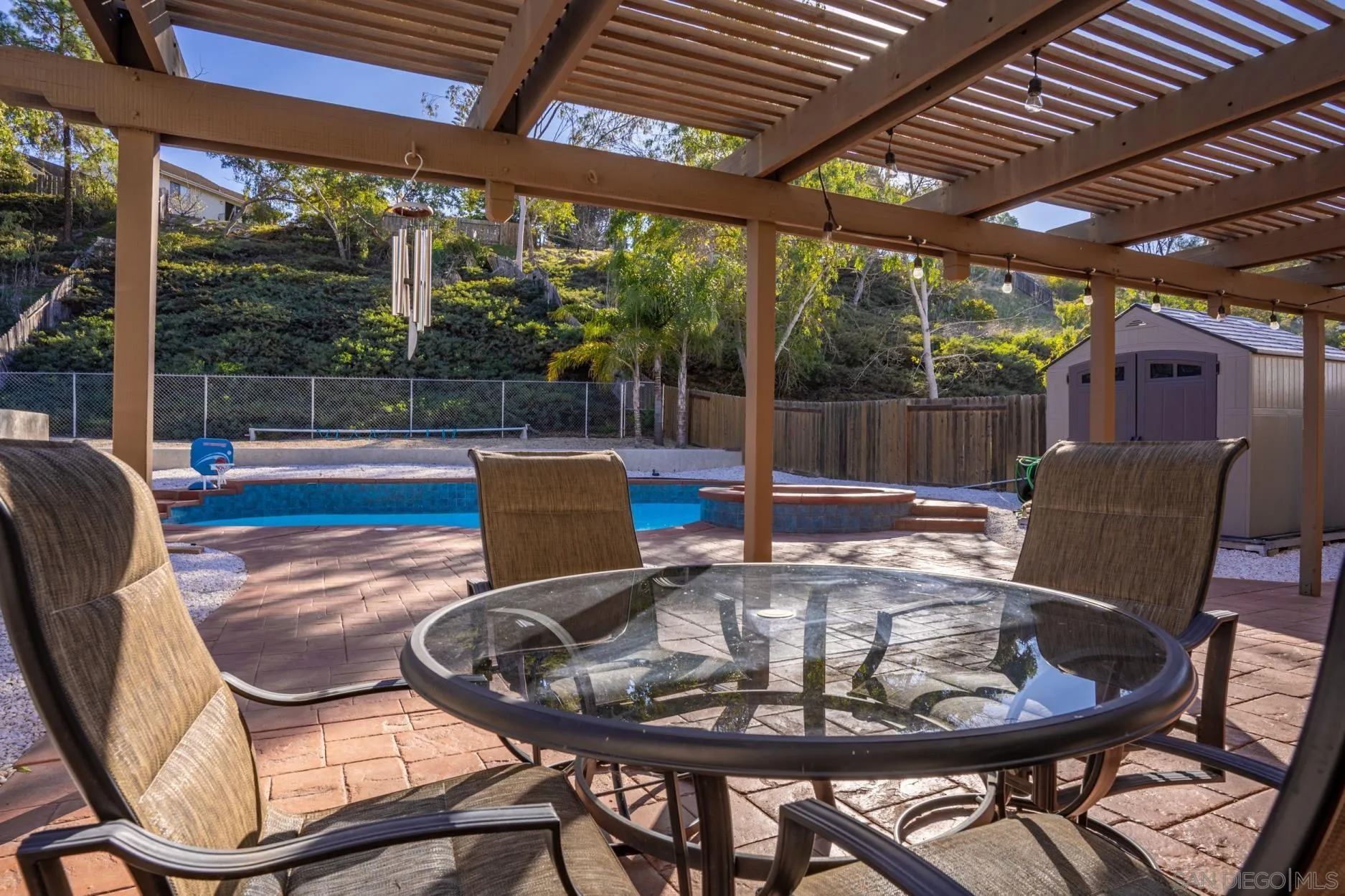 4857 Northerly Street Oceanside, CA 92056 - Photo 28 of 32 a view of a dining room with furniture wooden floor and a potted plant