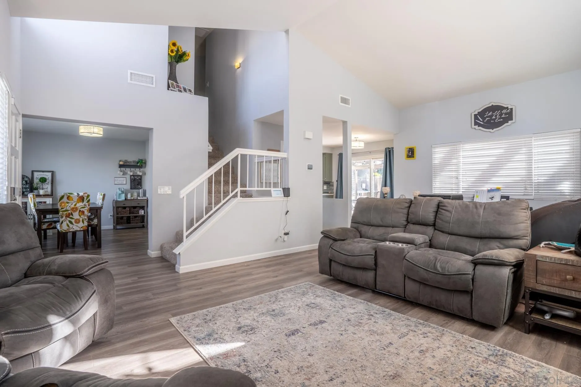 4857 Northerly Street Oceanside, CA 92056 - Photo 8 of 32 a living room with furniture and a large window