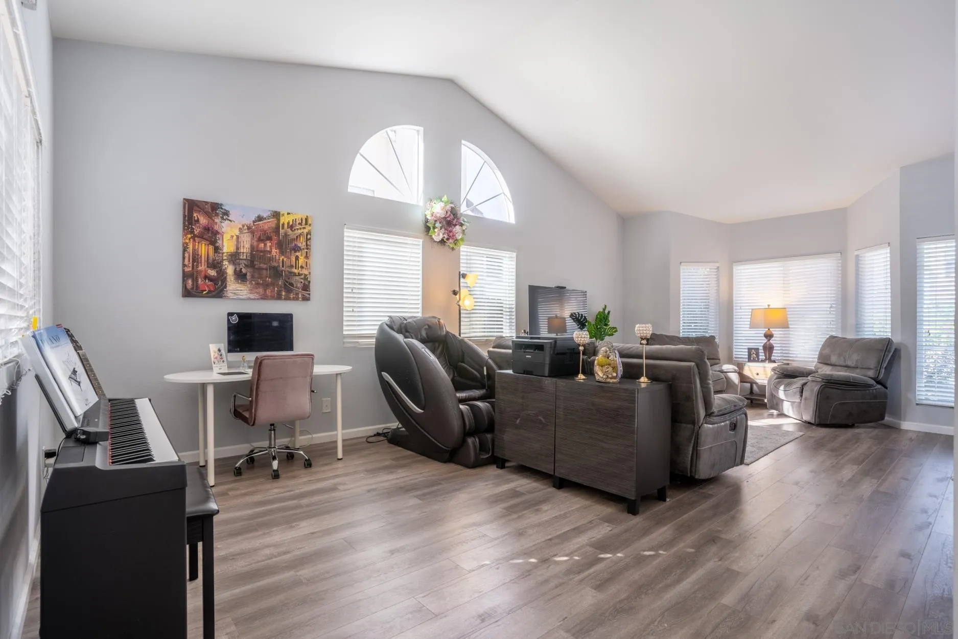 4857 Northerly Street Oceanside, CA 92056 - Photo 9 of 32 a living room with furniture or couch and a large window
