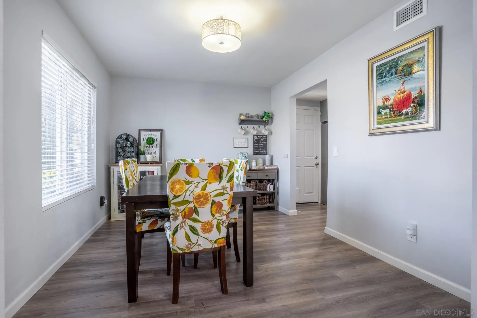 4857 Northerly Street Oceanside, CA 92056 - Photo 10 of 32 a dining room with furniture and window